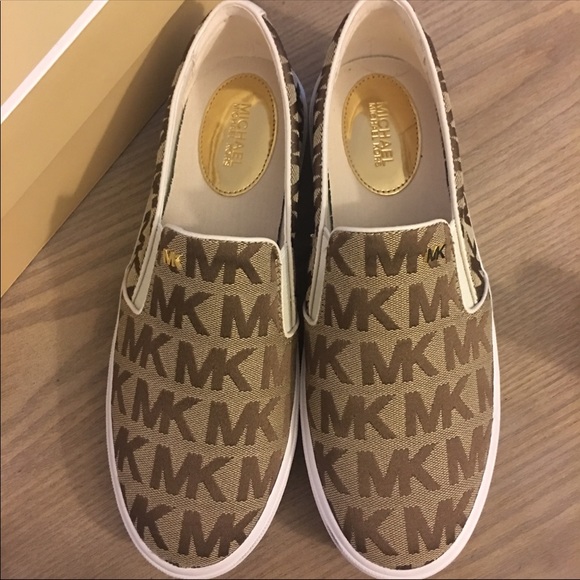 Michael Kors Shoes - NWOT MICHAEL KORS canvas signature slip on shoes